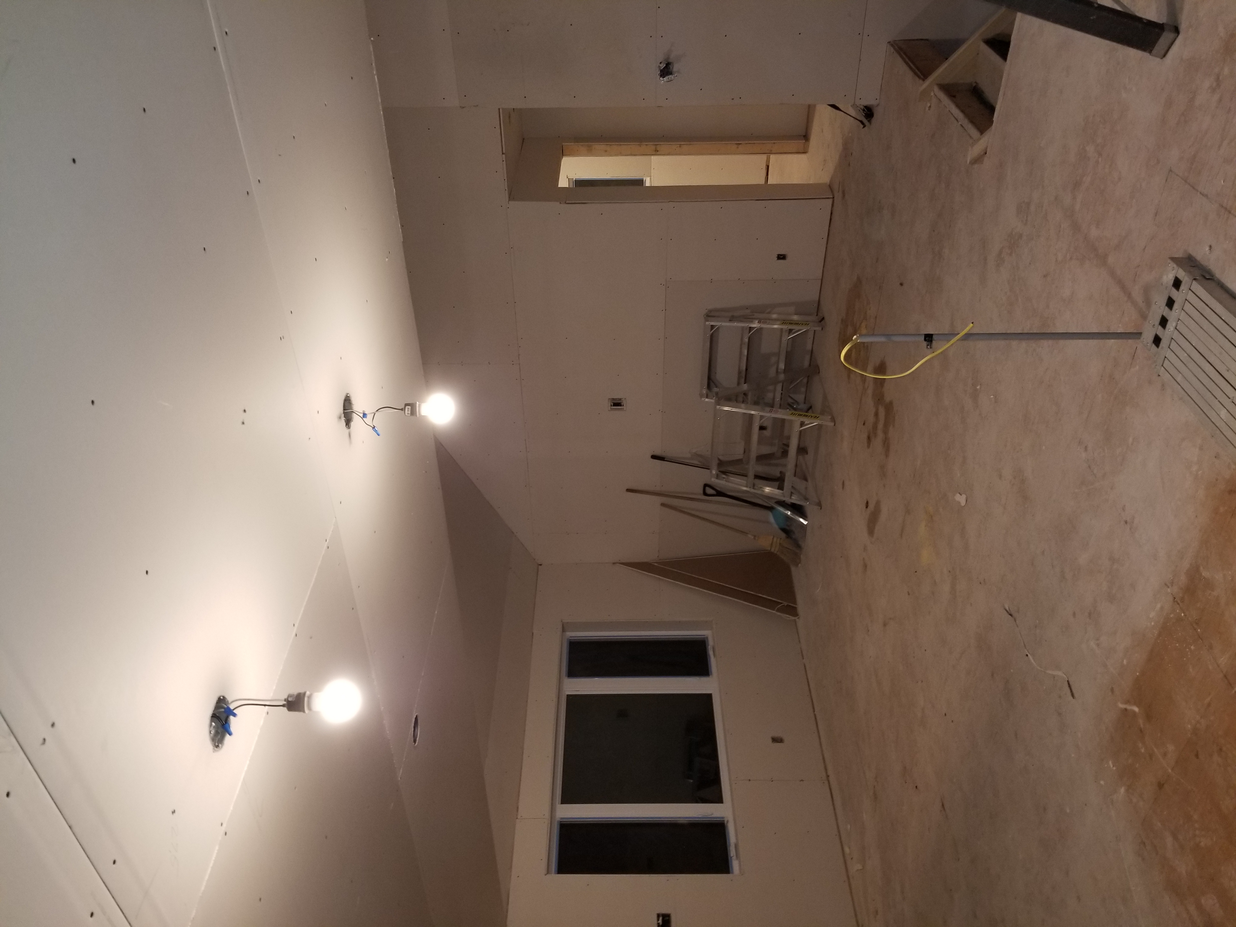 Professional drywall installation work showing clean seams and paint-ready finish by SoOptimal Contracting in Kitchener-Waterloo