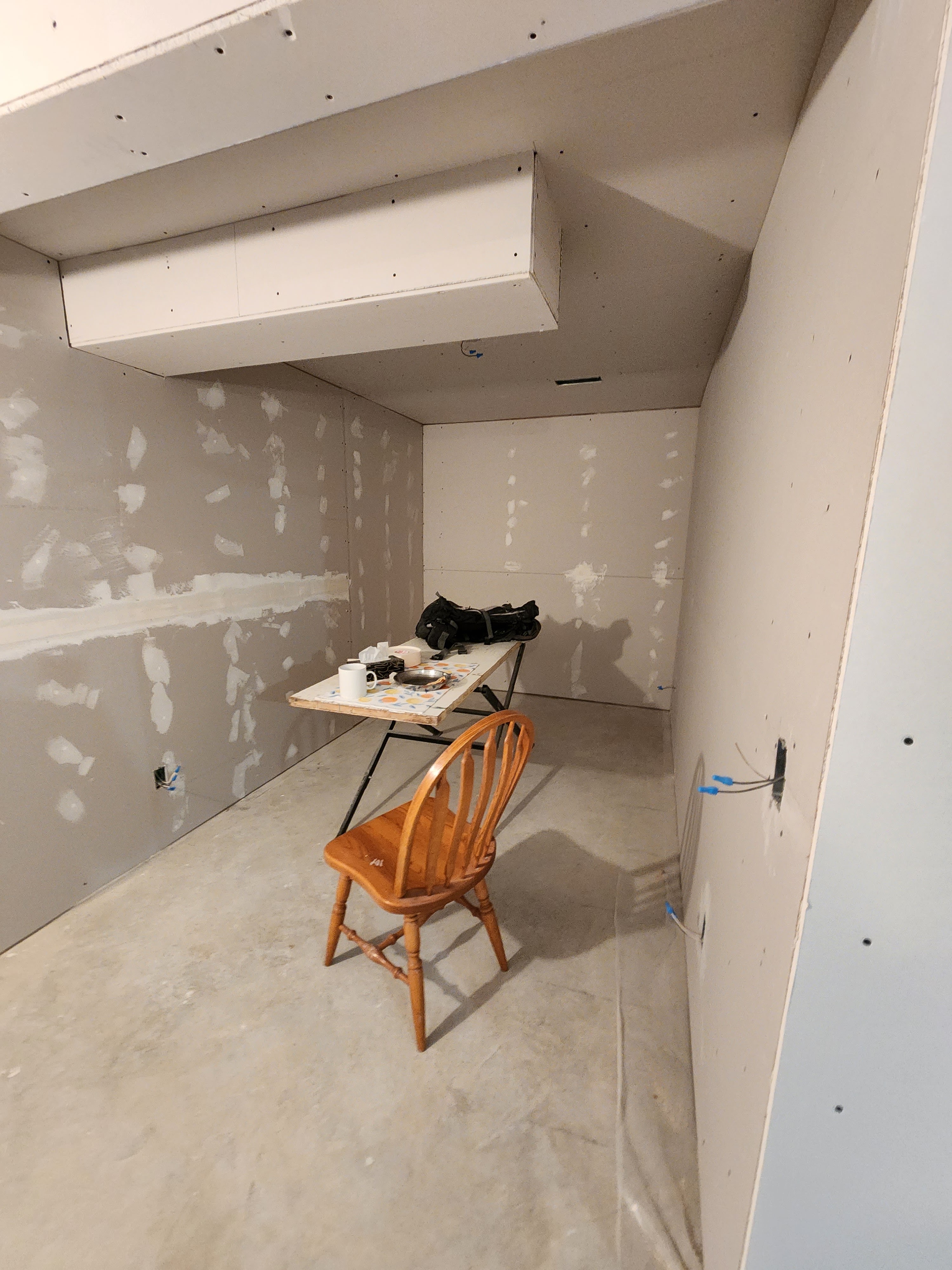 Multi-unit apartment building drywall project showing scale and quality